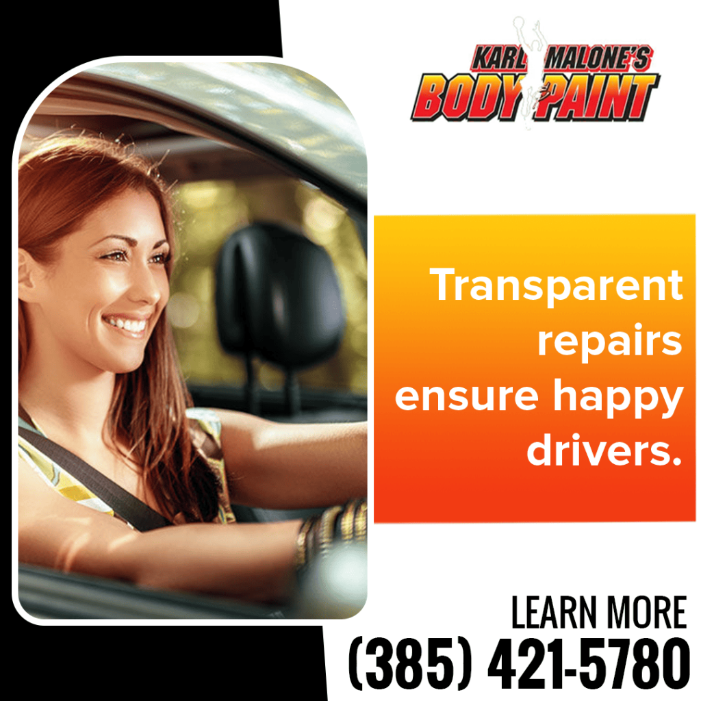 A smiling, happy woman driving her car after receiving transparent and high-quality repairs from Karl Malone's Body & Paint.