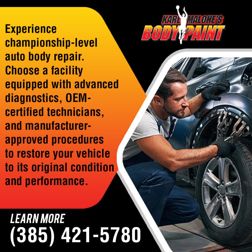 A certified technician at Karl Malone's Body & Paint uses advanced diagnostics and manufacturer-approved procedures to repair a vehicle.