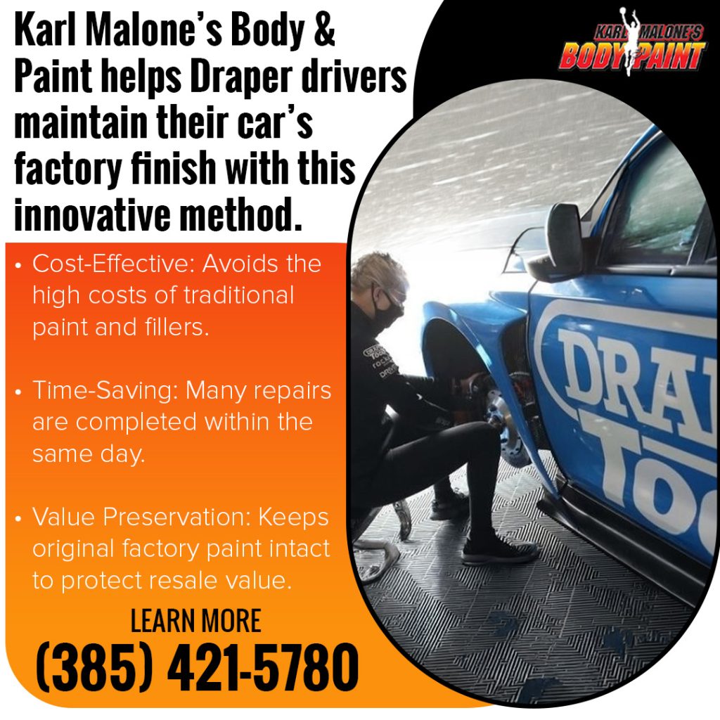 Technician using paintless dent repair on a blue vehicle at Karl Malone’s Body & Paint to preserve the factory finish and resale value
